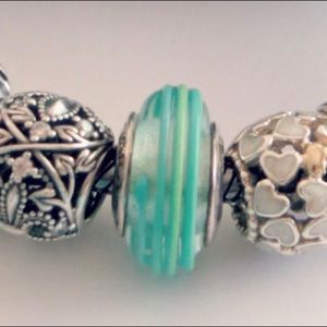 Pandora clear and teal ribbon murano charm